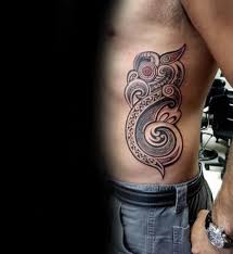 So choose any of these top and 10 cool rib tattoos for girls.and getting stunning with your tattoo designs. Top 40 Best Tribal Rib Tattoos For Men Manly Ink Design Ideas