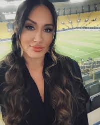 Michelle Joy Phelps Radiates Elegance On The Football…