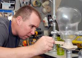 File:US Navy 101112-N-6320H-053 Nate Jackson, a technician and prosthetics  fabricator at the Naval Medical Center San Diego Prosthetics Laboratory,  uses.jpg