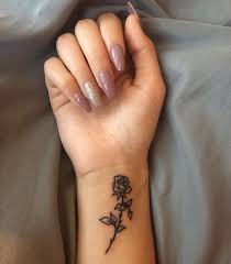 Discovered By Misty 99 Find Images And Videos About Nails Tattoo And Rose On We Heart It The Wrist Tattoos For Women Beautiful Small Tattoos Small Tattoos