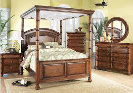 Shop For A Cindy Crawford Home Key West Dark Pine Canopy 6 Pc King Bedroom At Rooms To Go Find Bedroom Furniture Sets Rooms To Go Furniture Bedroom Sets Queen
