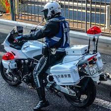 police of japan patrolman in leather uniform police emergency vehicles police cars