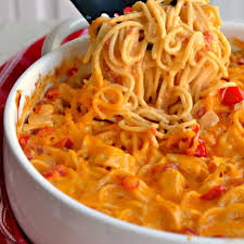 Spread spaghetti mixture on baking dish. Cheesy Chicken Spaghetti Small Town Woman