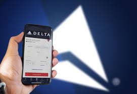 A passenger checking Delta flight change options on their smartphone.