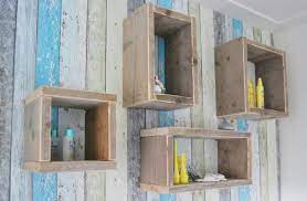 stoere kastjes aan de muur gemaakt van steigerhout kubus kast babykamer hout babykamer