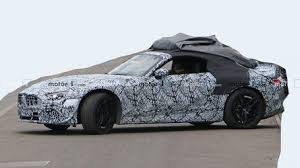 2022 Mercedes Sl Spied Looking Sleek Despite Heavy Camo In 2020 Mercedes Sl Mercedes Mercedes Benz