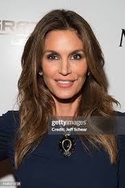 Patrick Rule, Cindy Crawford, and Scott Fortiano attend Michigan... News  Photo