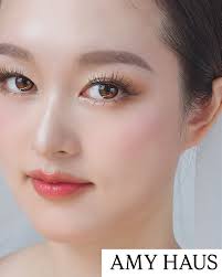 Pair coral pink with warm tones in your outfit or bouquet for a cohesive  look. Add subtle gold or rose-gold accents to enhance the coral hues for  photography. Makeup + Hair by @