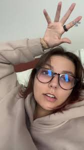 Elaine Reading The Messages Between Her and Her Sister