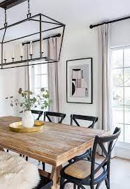 We offer a wide selection, big savings, financing and free shipping. Black French X Back Chairs Surround A Brown Wooden Trestle Dining Table Illuminated By A Darlan Brown Dining Room Farmhouse Dining Room Modern Farmhouse Dining