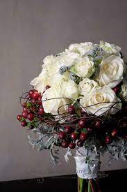 Natural looking palette of pure white roses and hydrangea blossoms. Pin By Redcliffe City Florist On Stunning Stunning Stunning Wedding Bouquets Red Bridal Bouquet Bridal Bouquet Boquette Wedding