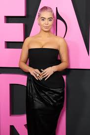 Aulii Cravalhos Buzzcut Was Pretty in Pink (and Pearls) at the Mean  Girls Premiere