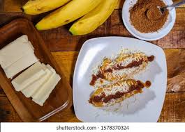 Pisang keju goreng sebenarnya hasil kreasi dan pengembangan makanan tradisional pisang goreng tepung. Pisang Goreng Keju Fried Banana Cheese Stock Photo Edit Now 1578370324