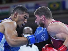 When allan nicolson watches his daughter compete in boxing he says it 'sends a shiver down his spine'. Lbgv2briopumdm