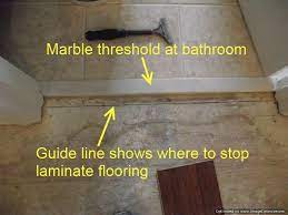 Building a custom threshold from my dining room to bathroom. Where To End Laminate At Doorways