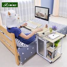 Wooden table top with unique wood grain. Simple Bed Side Laptop Desk With Stand Lazy Computer Desk Bed Pc Desk Desktop Table Home Rotating Moveable Laptop Table Shopee Singapore