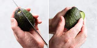 Using a sharp chef's knife, slice through the avocado lengthwise until you feel the knife hit the pit. How To Cut An Avocado Feelgoodfoodie