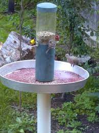 The Goal Was To Minimize Seeds Falling To The Ground Around This Feeder A 24 Pan Meant To Go Under Bird Seed Feeders Homemade Bird Feeders Diy Bird Feeder
