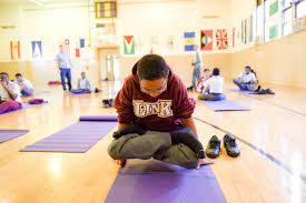 Olivia is a yoga teacher with a goal to make yoga more accessible and inclusive; Newark Yoga Movement