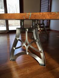 After purchasing materials, he measured and cut steel plate for the top and steel tube into lengths to make the frame and legs: Handcrafted Vintage Industrial Steampunk Metal Table Legs Industrial Metal Table Legs Vintage Metal Table Industrial Table Legs
