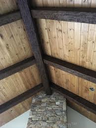 Warm colors, especially wood and earth tones, tend to reduce the perceived height of a ceiling. Wood Ceiling Planks Beautiful Vaulted Ceiling Beams Gallery Photos And Ideas To Inspire Wood Beam Ceiling Wood Plank Ceiling Vaulted Ceiling Beams