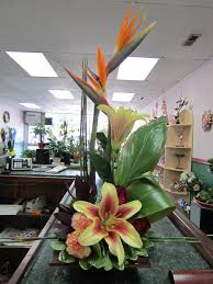 Bird Of Paradise Silk Flower Arrangement High Style Arrangement With Some Funky Birds Of Paradise And A Gorgeous Lily In 2020 Fresh Flowers Arrangements Large Flower Arrangements Tropical Floral Arrangements