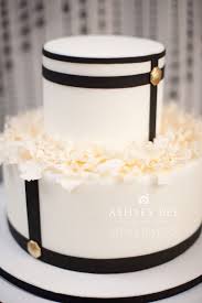Black And White Wedding Cakes Black Cream W A Hint Of Gold Wedding Cake Different Chanel Cake Elegant Cakes Black And White Wedding Cake