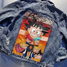 The left sleeve features white embroidered outlines of the dragon balls and the back has a large patch and embroidery featuring goku's name and the dbz title in japanese. Goku Jeans Promotions