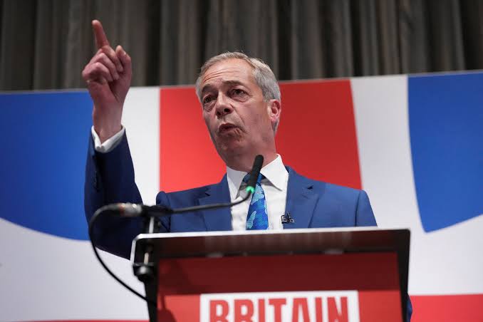 UK right-winger Farage doused with drink at election campaign launch |  Reuters
