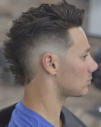 The traditional mohawk features a thin strip of hair down the middle and shaved sides. Faded Mohawk Hair Styles 20 Ways To Rock That Hawk In Style Atoz Hairstyles