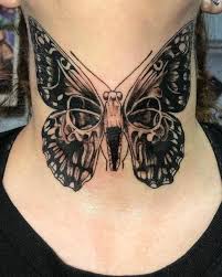 Skull butterfly neck tattoo female