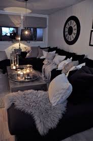 The living room has an open space layout which incorporates the dining area and a cozy seating nook as well. Black And Gray Go Well Stue Hjem Stue Ideer