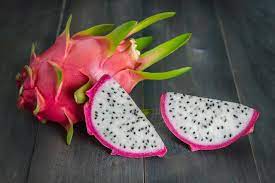 Cut a ripe dragon fruit in half and scoop out the black seeds. How To Grow Dragon Fruit From Seed Hgtv