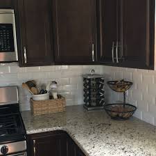 Dark Cabinets White Subway Tile And Neutral Granite Backsplash Kitchen Dark Cabinets Dark Kitchen Cabinets Espresso Kitchen Cabinets