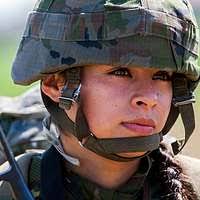 A Spanish Soldier from the Brigada Paracaidista gathers