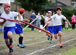 Relay races are games where equal teams race to achieve a task. Students Use 2 Meter Long Social Distancing Batons In Relay Race At Japan School The Mainichi