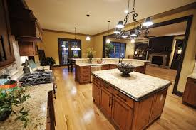 In this kitchen, black pulls and hinges look great with the white cabinetry, countertops and backsplash. 52 Enticing Kitchens With Light And Honey Wood Floors Pictures Home Stratosphere