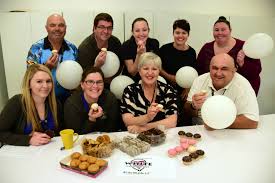 Showing their support with white balloons