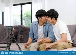 Two Young Asian Men Gay Couple Blogger Kissing while Recording Video, Live  at Home Living Room, Homosexual and Lgbt Concept Stock Image - Image of  kiss, boyfriend: 171288489