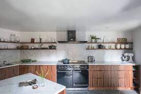 Not having upper cabinets has the effect of making even a smaller kitchen seem much bigger and brighter — and also provides opportunities for dramatic wall lighting, as seen in this space from bolig, via planete deco. What If You Didn T Have Upper Cabinets In Your Kitchen Best Online Cabinets