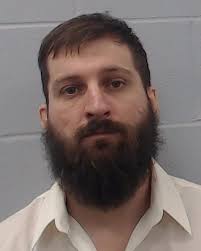 Jacobo Mata, Eduardo was booked into the Hays County Jail