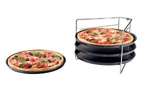 · don't eat the whole pie! Lidl Reveals Genius Life Hack Pizza Oven Stand That Cooks Four At A Time