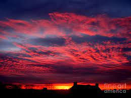 Timelapse of the sunlight in a beautiful cloudy sky. Beautiful Cloudy Sky At Sunset Above Town Roofs Photograph By A R