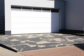 Many homeowners have two cars and need garage space to shelter them both. Sesame Garage Doors Single Panel V Sectional Garage Doors Sesame Garage Doors