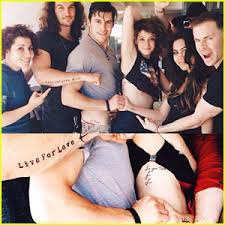 The cast of glee have a lot of things common: Ashley Argota Gets Tattoos With Love Is A Battlefield Cast Andrew Pirozzi Ashley Argota Jordan Kai Burnett Rustin Cole Sailors Just Jared Jr