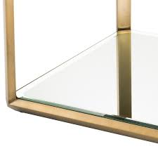 Its brushed brass frame with bevelled rims surrounds the tabletops of smoke glass and the bottom shelves of mirror glass. Callum Side Table Eichholtz Luxdeco Com