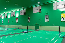 Badminton practice at home without court and players. Badminton Chinese Swimming Club