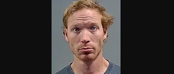 Man charged in Escambia County with making sexual contact with his new dog