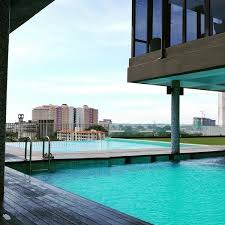 Boasting pool views, relaxing villa d'faro deluxe ~ stay+swim+bbq features accommodation with an outdoor swimming pool, a bar and a garden the en suite bathroom comes with a rainshower and a hairdryer. Photos At Swimming Pool The Pines Melaka Hotel Melaka Melaka