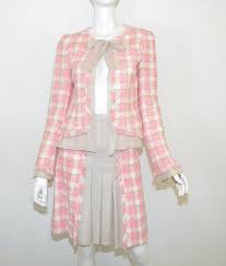 Make sure your yarn is thin enough to pass through the knitting dolly. Chanel Pink Beige Tweed Knit Skirt And Jacket Set With Chiffon Trim For Sale At 1stdibs